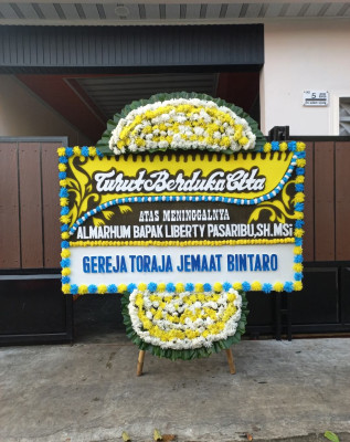 Papan Bunga Duka di Bajo
